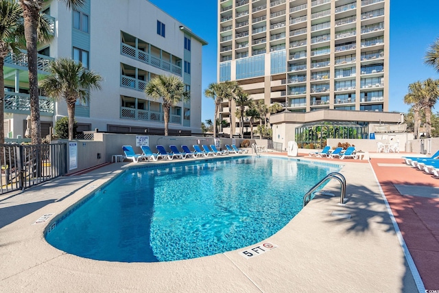 view of swimming pool featuring a patio