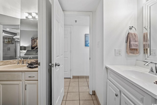 bathroom with vanity and tile patterned floors