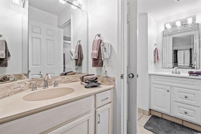 bathroom featuring vanity and tile patterned floors