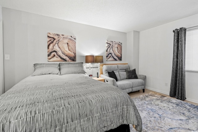 bedroom featuring a textured ceiling