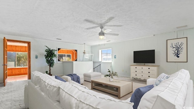 3545 Marion Ln, Murrells Inlet, SC 29576 - living area with ceiling fan, a textured ceiling, and carpet floors