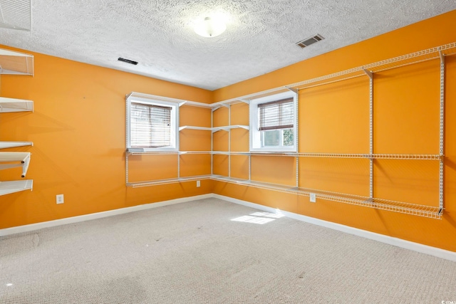 3545 Marion Ln, Murrells Inlet, SC 29576 - carpeted spare room featuring baseboards and a textured ceiling