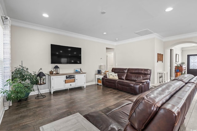 living room featuring ornamental molding and dark hardwood / wood-style floors