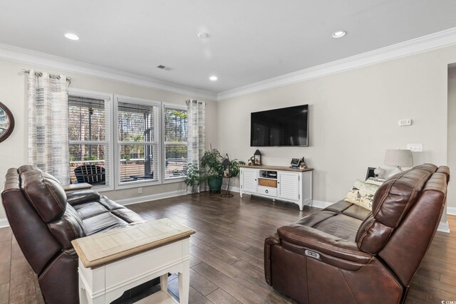 living room featuring dark wood-type flooring and ornamental molding