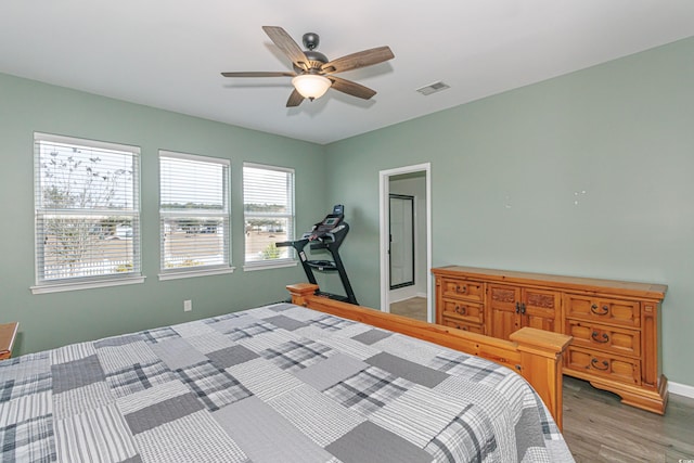 bedroom featuring ceiling fan and light hardwood / wood-style flooring