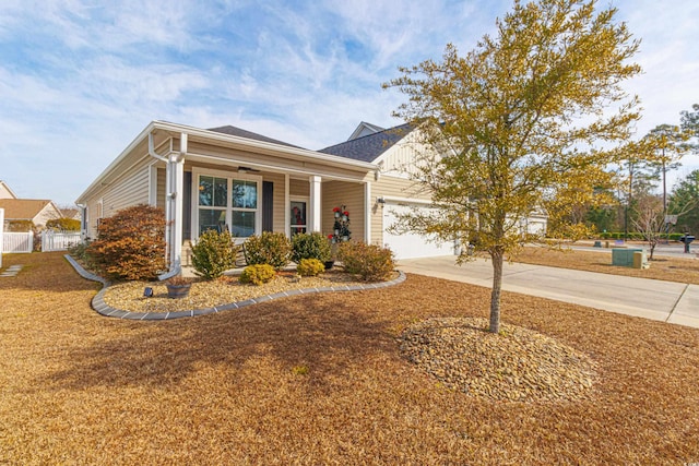 view of front of house with a garage and covered porch