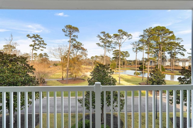 balcony featuring a water view