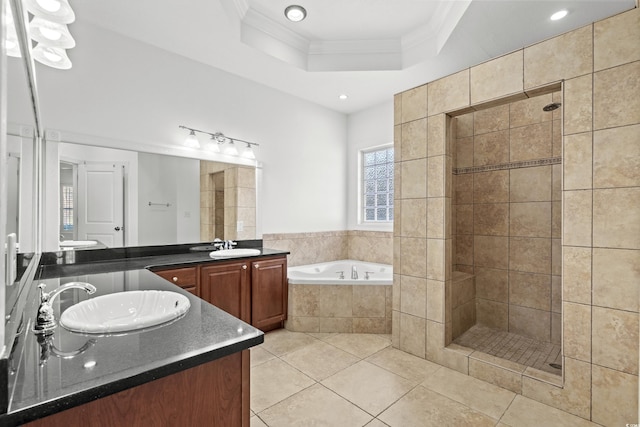 bathroom featuring shower with separate bathtub, tile patterned flooring, vanity, a raised ceiling, and crown molding