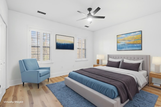 bedroom featuring ceiling fan and light wood-type flooring