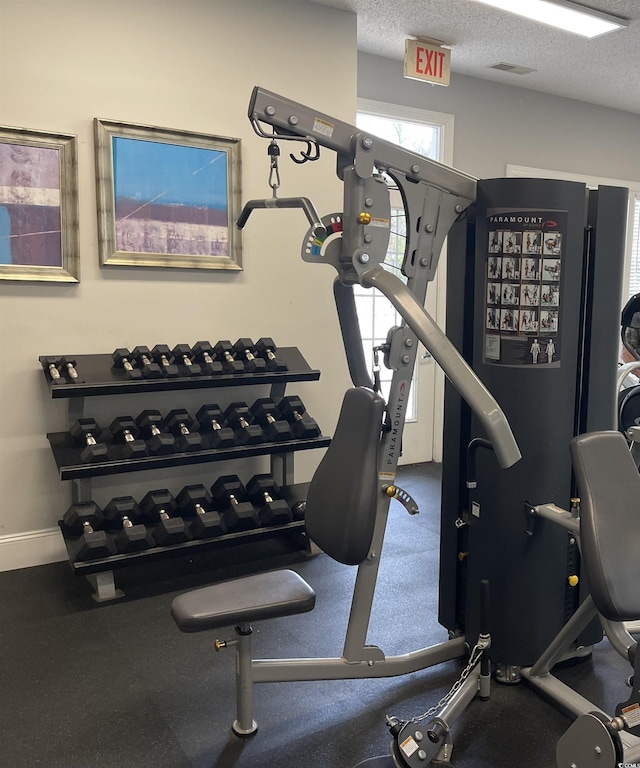 9764 Leyland Dr Unit 7, Myrtle Beach, SC 29572 - exercise room with a textured ceiling and baseboards