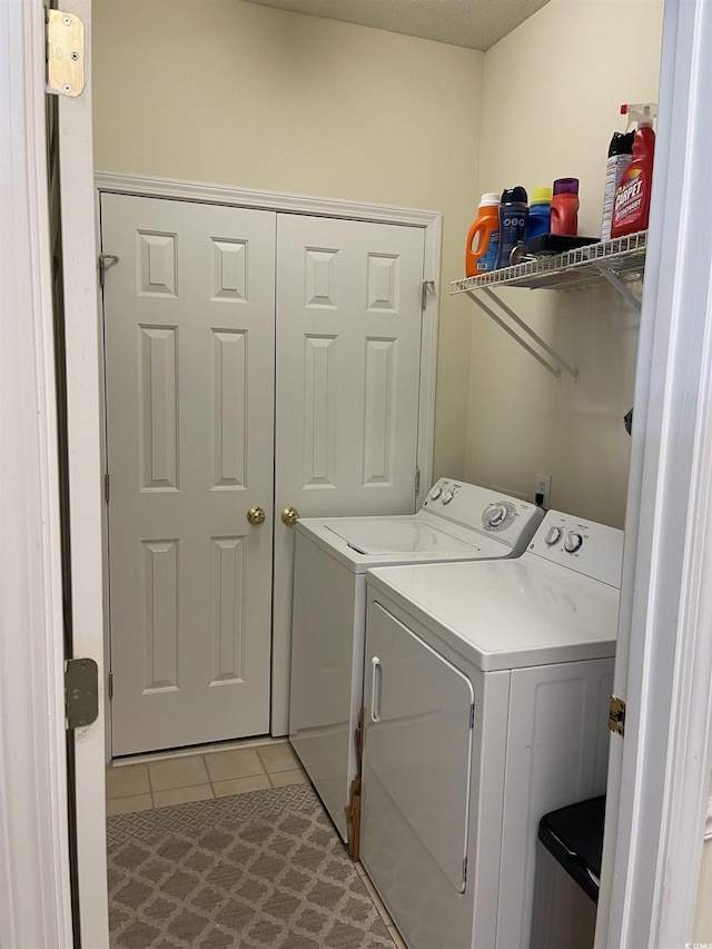 9764 Leyland Dr Unit 7, Myrtle Beach, SC 29572 - laundry room featuring independent washer and dryer and light tile patterned floors