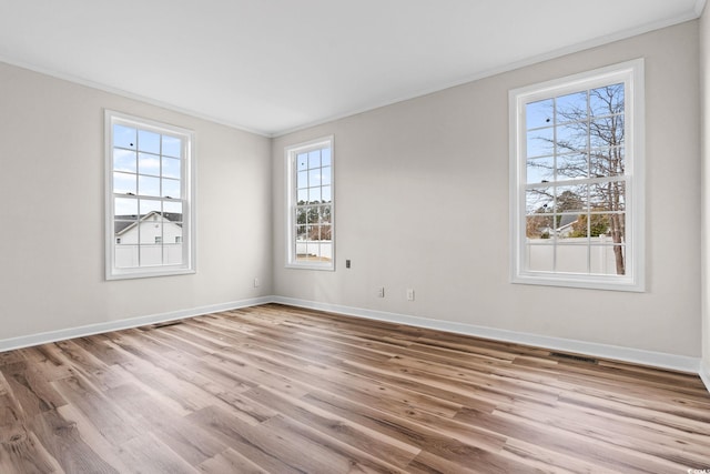 112 Staton Ln, Longs, SC 29568 - unfurnished room with ornamental molding, healthy amount of natural light, and wood finished floors