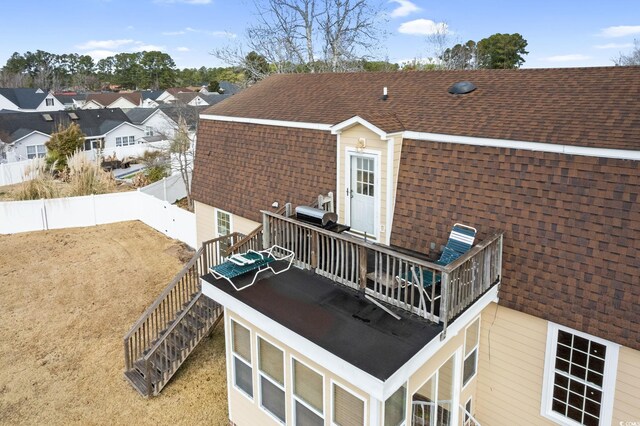 112 Staton Ln, Longs, SC 29568 - rear view of house with a shingled roof, a fenced backyard, and stairs