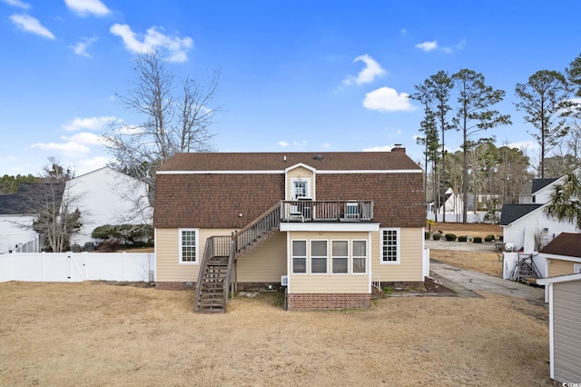 112 Staton Ln, Longs, SC 29568 - back of house featuring stairway, roof with shingles, a gambrel roof, and a chimney