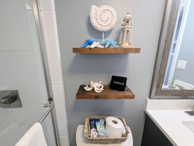 bathroom featuring vanity and walk in shower