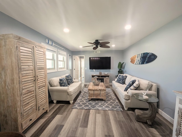 living room with recessed lighting, wood finished floors, baseboards, visible vents, and a ceiling fan