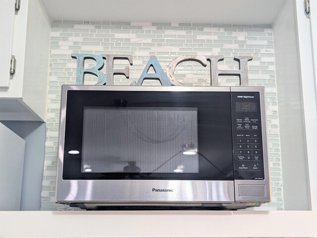 room details featuring stainless steel microwave