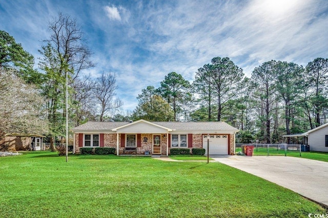 single story home with a porch, a garage, and a front yard