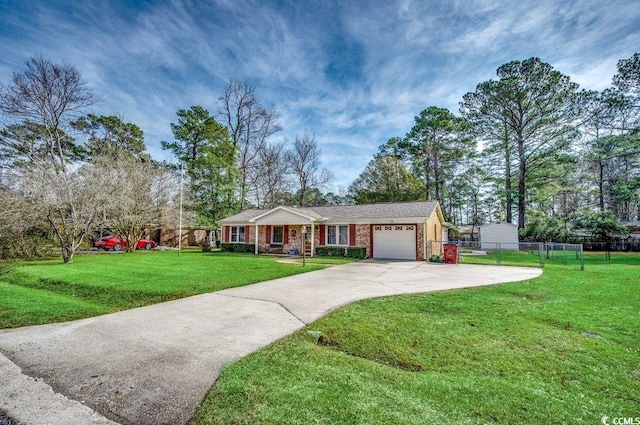 ranch-style house featuring a garage and a front yard