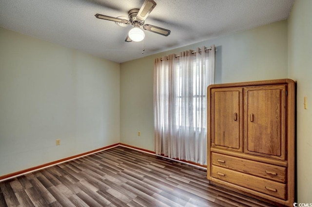 unfurnished bedroom featuring ceiling fan, light hardwood / wood-style flooring, and a textured ceiling