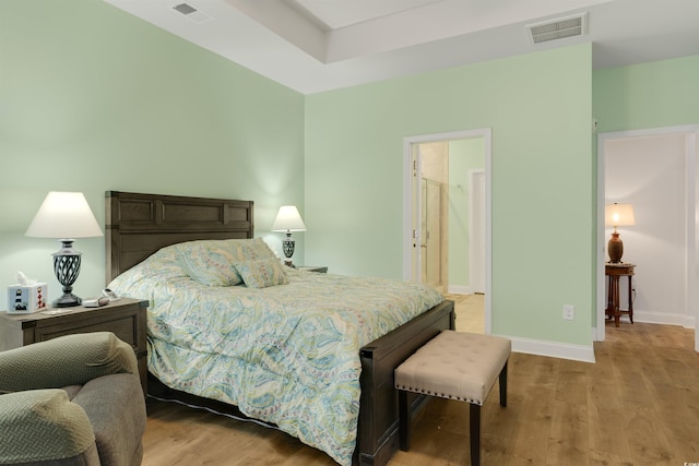 bedroom with light hardwood / wood-style floors