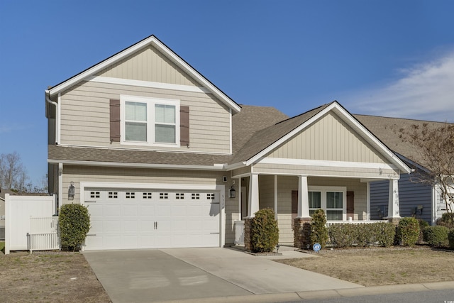 craftsman house with a garage and covered porch