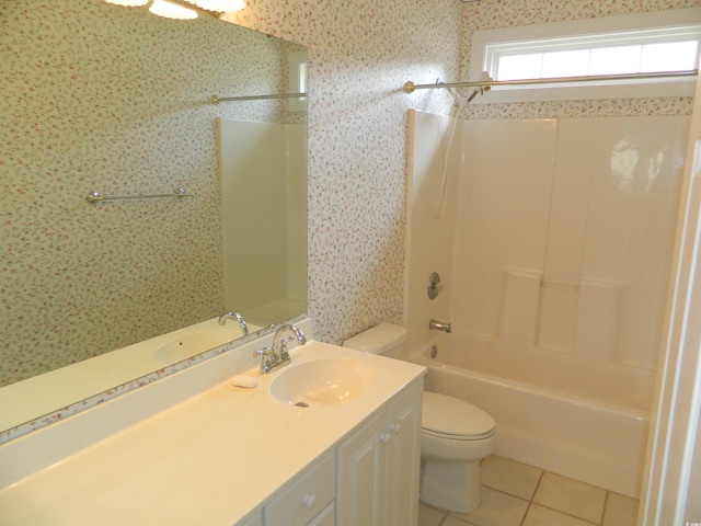 full bathroom with shower / washtub combination, toilet, tile patterned flooring, and vanity