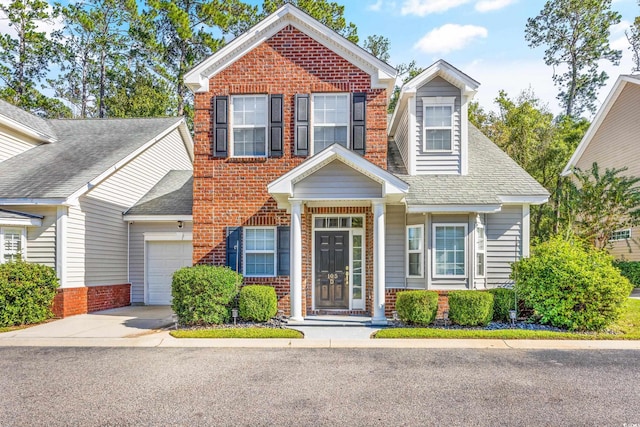 view of front of house with a garage