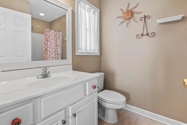 bathroom with baseboards, a shower with shower curtain, toilet, tile patterned flooring, and vanity