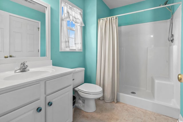 full bathroom featuring toilet, a shower stall, visible vents, and vanity