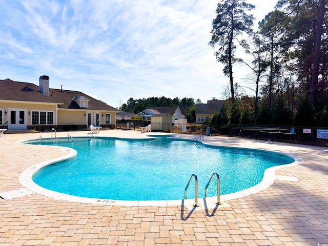 view of pool with a patio area