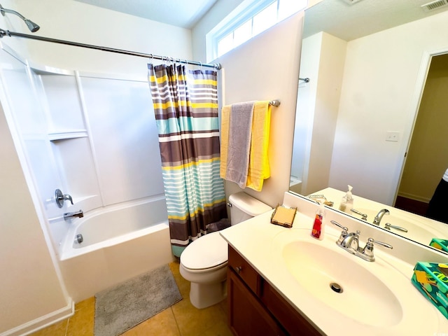 full bathroom featuring toilet, tile patterned floors, shower / bathtub combination with curtain, and vanity