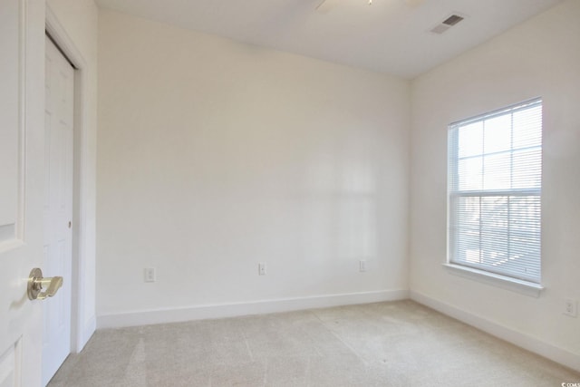 view of carpeted spare room