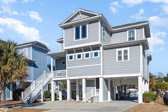 view of front of property featuring a carport