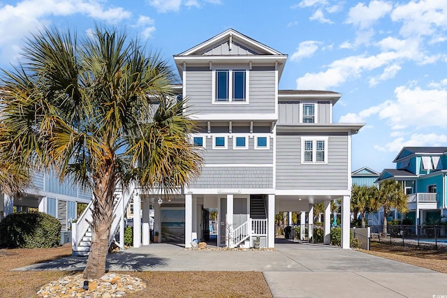 beach home featuring a carport