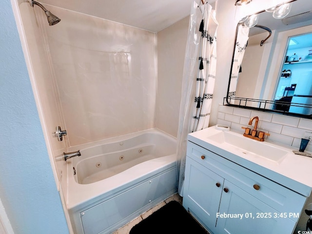 bathroom with shower / tub combo with curtain, sink, and decorative backsplash