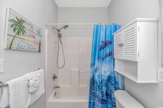 full bathroom with shower / tub combo with curtain and toilet