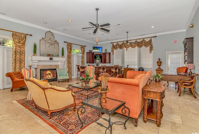 living room with recessed lighting, a fireplace, visible vents, and crown molding