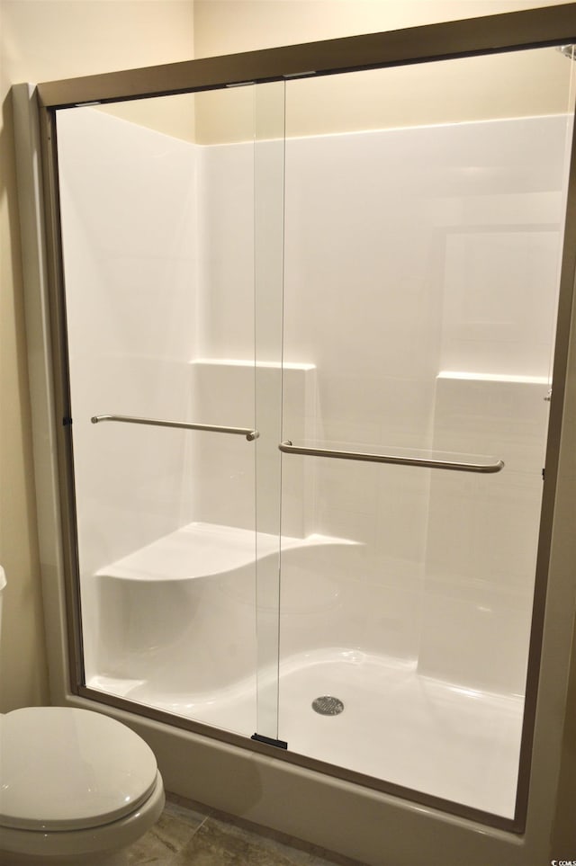 81 Delray Dr Unit 2-C, Murrells Inlet, SC 29576 - bathroom with a shower stall and toilet