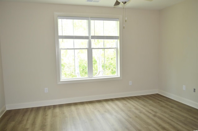 81 Delray Dr Unit 2-C, Murrells Inlet, SC 29576 - empty room featuring baseboards, wood finished floors, and ceiling fan