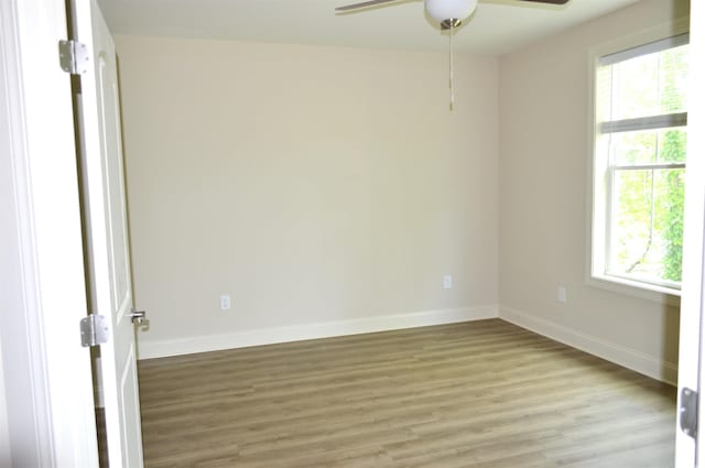 81 Delray Dr Unit 2-C, Murrells Inlet, SC 29576 - empty room with a ceiling fan, light wood-type flooring, and baseboards