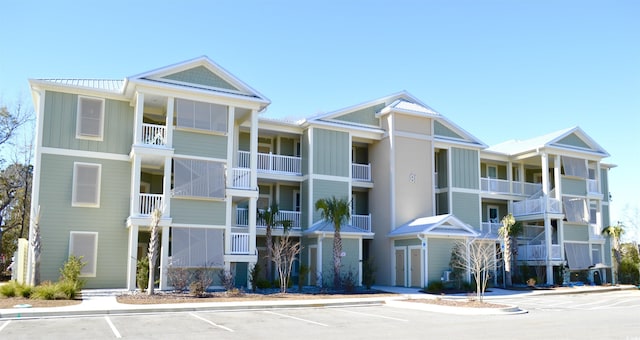 81 Delray Dr Unit 2-C, Murrells Inlet, SC 29576 - view of apartment building / complex featuring uncovered parking