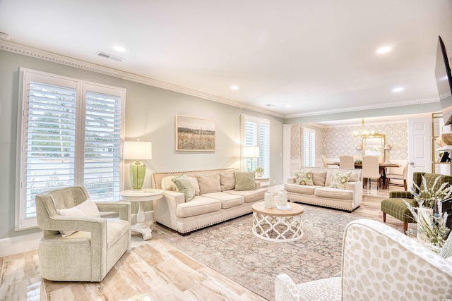 living room featuring crown molding