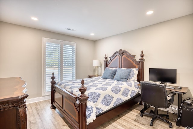 bedroom with light hardwood / wood-style flooring