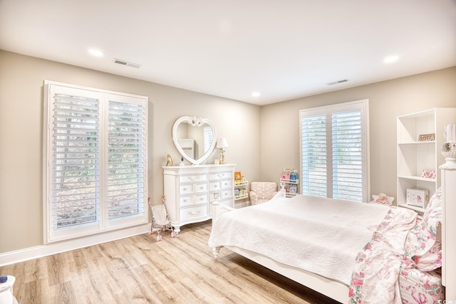 bedroom featuring light hardwood / wood-style flooring