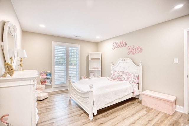 bedroom featuring light hardwood / wood-style flooring