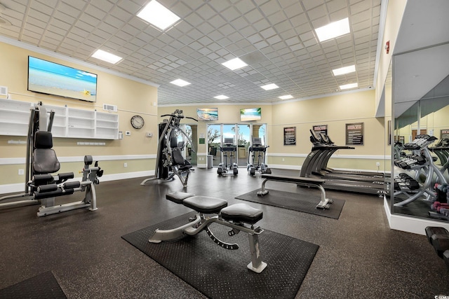 workout area featuring a drop ceiling