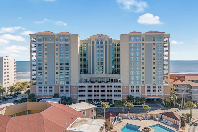 view of property with a water view