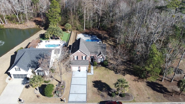 drone / aerial view featuring a water view