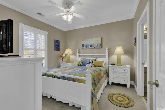 bedroom featuring crown molding, light carpet, and ceiling fan